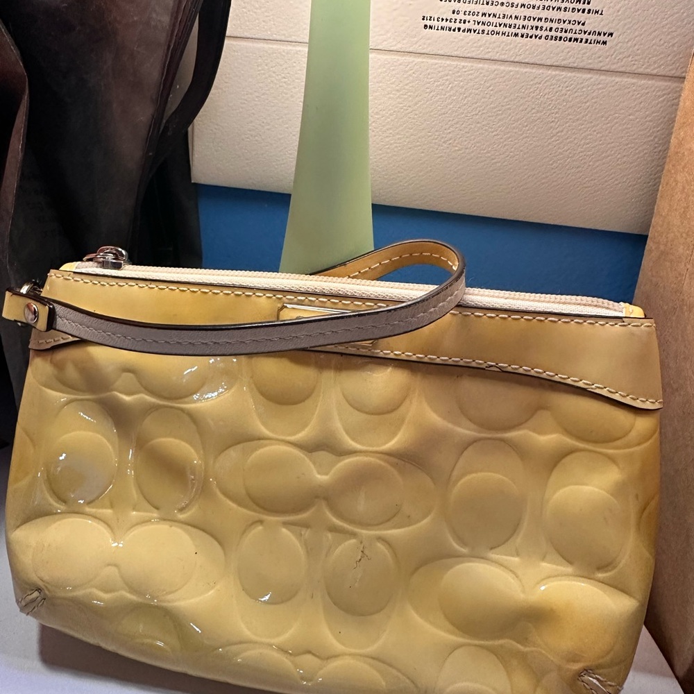 Coach Yellow Embossed Leather Wristlet